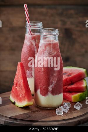 Ice-cold melon smoothies with watermelon, galia melon and yoghurt Stock Photo