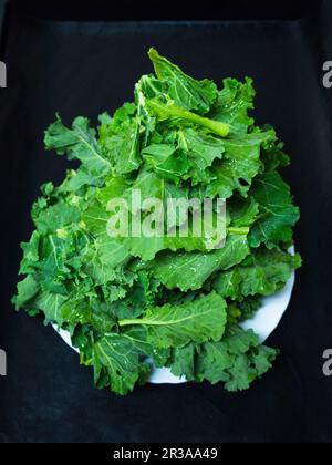 Fresh kale leaves in a bowl Stock Photo