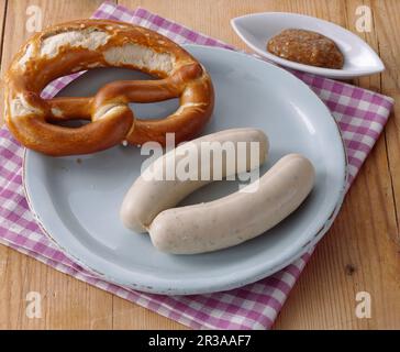 A pair of white sausages with pretzel and sweet mustard (snack, Bavaria) Stock Photo