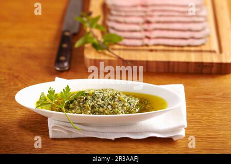 Salsa Verde served with cold roast beef Stock Photo
