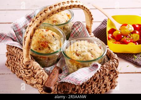 Baked yeast bread with zucchini, cheese and ham in glasses Stock Photo