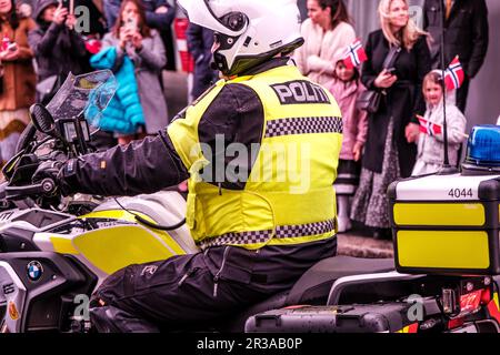 Sandnes, Norway, May 17 2023, Norwegian Policeman Riding Motorcyle During National Day Parade Celebrations Stock Photo