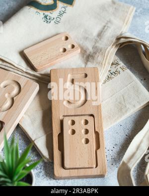 Wooden counting and writing trays - learning resource for educating littles on number writing, fine Stock Photo