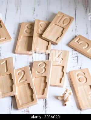 Wooden counting and writing trays - learning resource for educating littles on number writing, fine Stock Photo