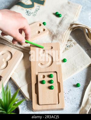 Wooden counting and writing trays - learning resource for educating littles on number writing, fine Stock Photo