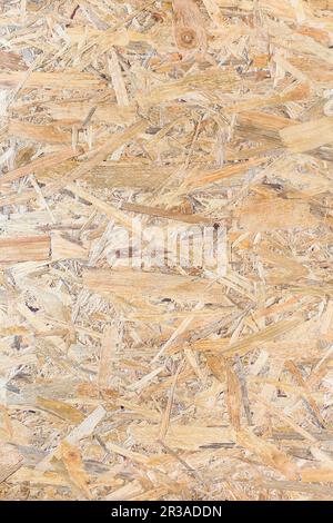 OSB panel texture. Oriented Strand Board. Chipboard building material. OSB wooden panel made of pres Stock Photo