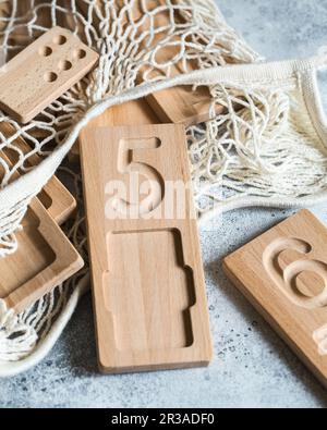 Wooden counting and writing trays - learning resource for educating littles on number writing, fine Stock Photo