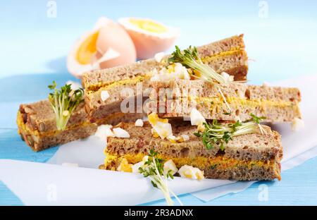Pumpkin seed bread with carrot and chervil butter (lunch) Stock Photo