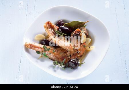 Marinated braised rabbit with black olives (Spain) Stock Photo