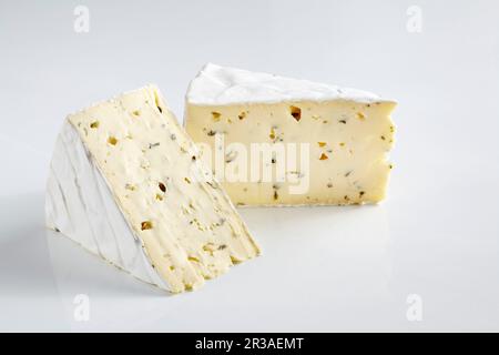 Soft cheese with white mold and garlic flavouring Stock Photo