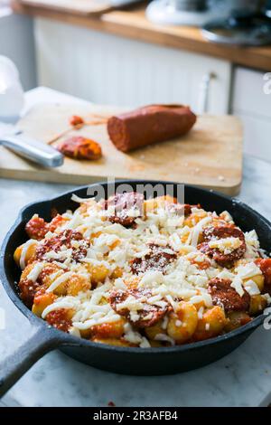 Unbaked gnocchi with chorizo Stock Photo