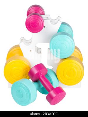 Stack of bright colored athletic rubber dumbbells Stock Photo