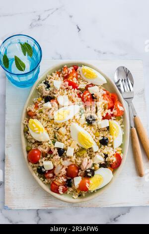 Italian rice salad with eggs and tuna Stock Photo