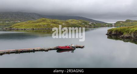 Pier in the sheltered Bay of North Harbour, Scalpay of Harris, Hebrides, Outer Hebrides, Western Isles, Scotland, United Kingdom, Great Britain Stock Photo