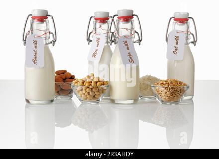 Bottles of vegan drinks with labels Stock Photo