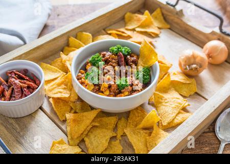 Chilli con carne with nachos Stock Photo