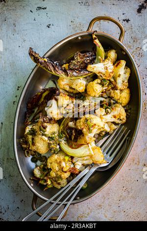 Roasted Cauliflower with Gunpowder spice mix Stock Photo