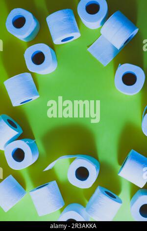 Top view of toilet paper rolls frame on the green Stock Photo