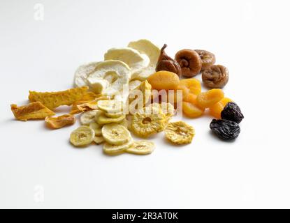 Various dried fruits on a white background Stock Photo