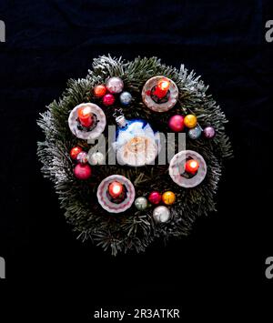 Advent wreath with four burning candles Stock Photo
