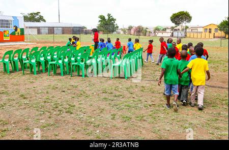 African Children attending an outside preschool classroom Stock Photo