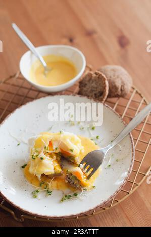 Poached Eggs Benedict on bread Stock Photo