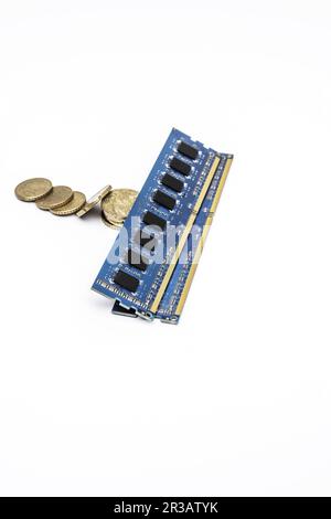 Some ddr3 ram memory modules without heat sinks on some euro dividing coins Stock Photo