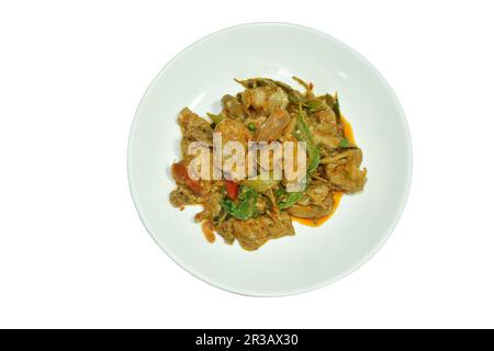 stir fried spicy wild boar and finger root with red curry on plate Stock Photo