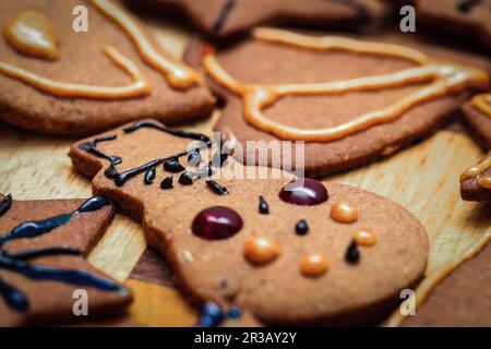 Children hand decorated gingerbread cookies Stock Photo