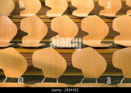 Edinburgh, Scotland - 11 Oct 2013: The unique interior design of the Scottish Parliament. The iconic seating of the debating chamber gallery was desig Stock Photo
