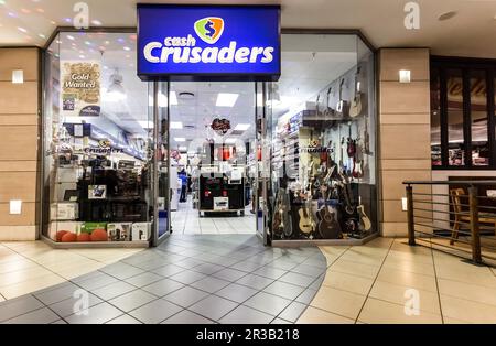 Entrance to Cash Crusaders Pawn shop in a mall Stock Photo