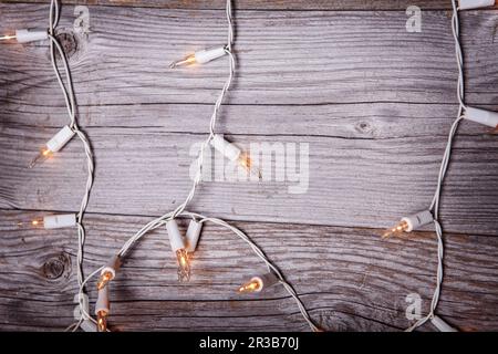 Grunge plank wood texture background. Garland Lights Wood Background, Wooden Board Texture with Holi Stock Photo