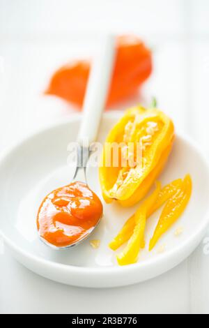 Chili ketchup and golden habanero Stock Photo