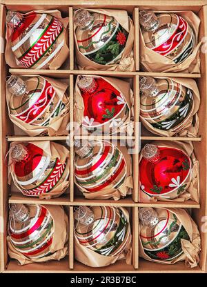 Set of 12 Luxury Winterberry Glass Baubles. Retro styled image of vintage Christmas decoration in a Stock Photo