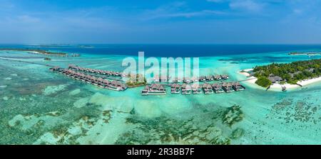 Scenic view of Lankanfushi Island amidst turquoise ocean in Maldives Stock Photo