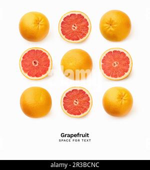 Creative pattern with fresh grapefruits isolated Stock Photo