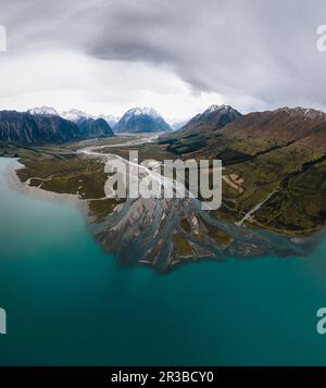 Lake Ohau and Ben Ohau Range on a rainy summer day. South Island, New ...