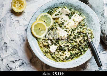 Spanakorizo (Greek rice with spinach and feta) Stock Photo