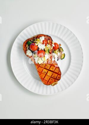 Stuffed butternut halves Stock Photo