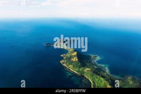 Coron island amidst blue sea in Philippines Stock Photo