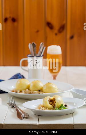 Gram dumplings on sauerkraut Stock Photo
