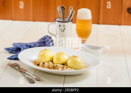 Gram dumplings on sauerkraut Stock Photo