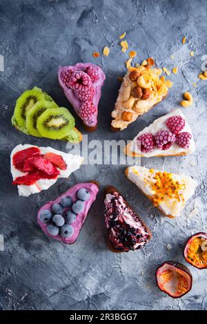 Sponge cake with multiflavored fruit cream and fruit Stock Photo