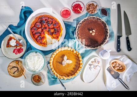 Tarte Tatin, butternut squash pie, chocolate silk tart Stock Photo