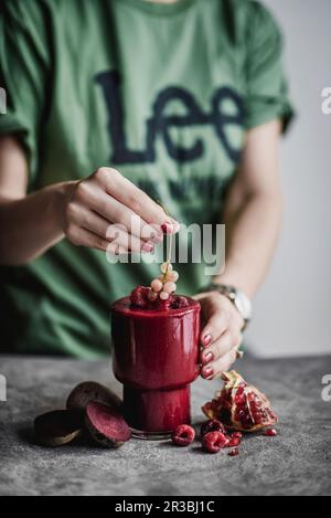 Beetroot smoothie with raspberries and pomegranate Stock Photo
