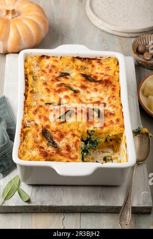 Pumpkin lasagne with ricotta, spinach and mozzarella Stock Photo