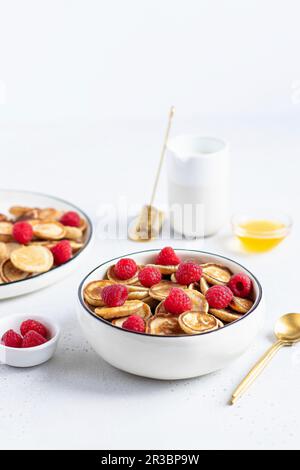 Mini pancake cereal Stock Photo by arina-habich
