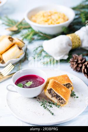 Croquettes with mushrooms with beetroot soup Stock Photo