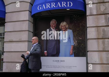 London UK. 23 May 2023  A portrait of King Charles III and Queen Camilla is displayed at Garrard  Jewellery store in Mayfair to celebrate the coronation. Credit: amer ghazzal/Alamy Live News Stock Photo