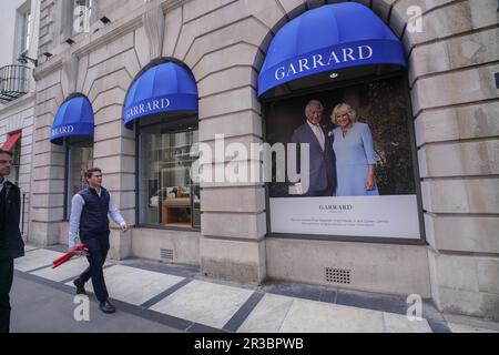 London UK. 23 May 2023  A portrait of King Charles III and Queen Camilla is displayed at Garrard  Jewellery store in Mayfair to celebrate the coronation. Credit: amer ghazzal/Alamy Live News Stock Photo